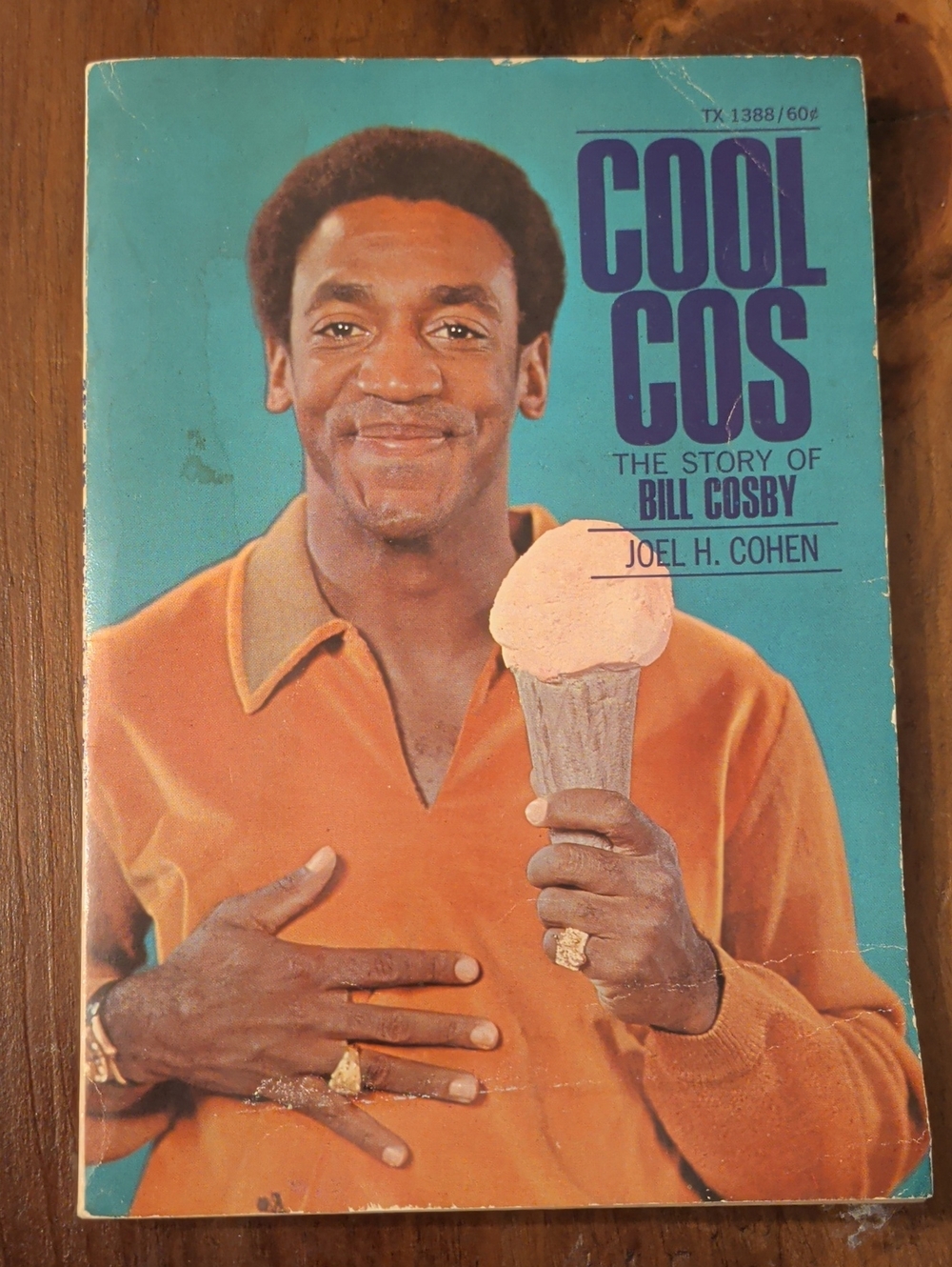 Vintage Paperback Biography with Bright Teal & Orange Cover